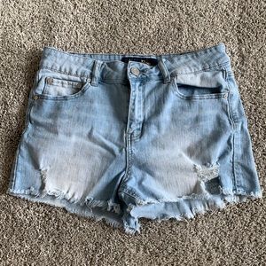 Light wash distressed denim shorts